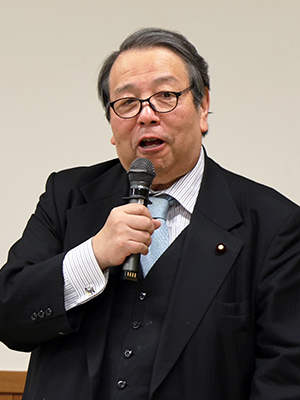 挨拶する村上大臣